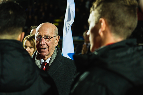 Sir Bobby Charlton meets players from the British Army team.